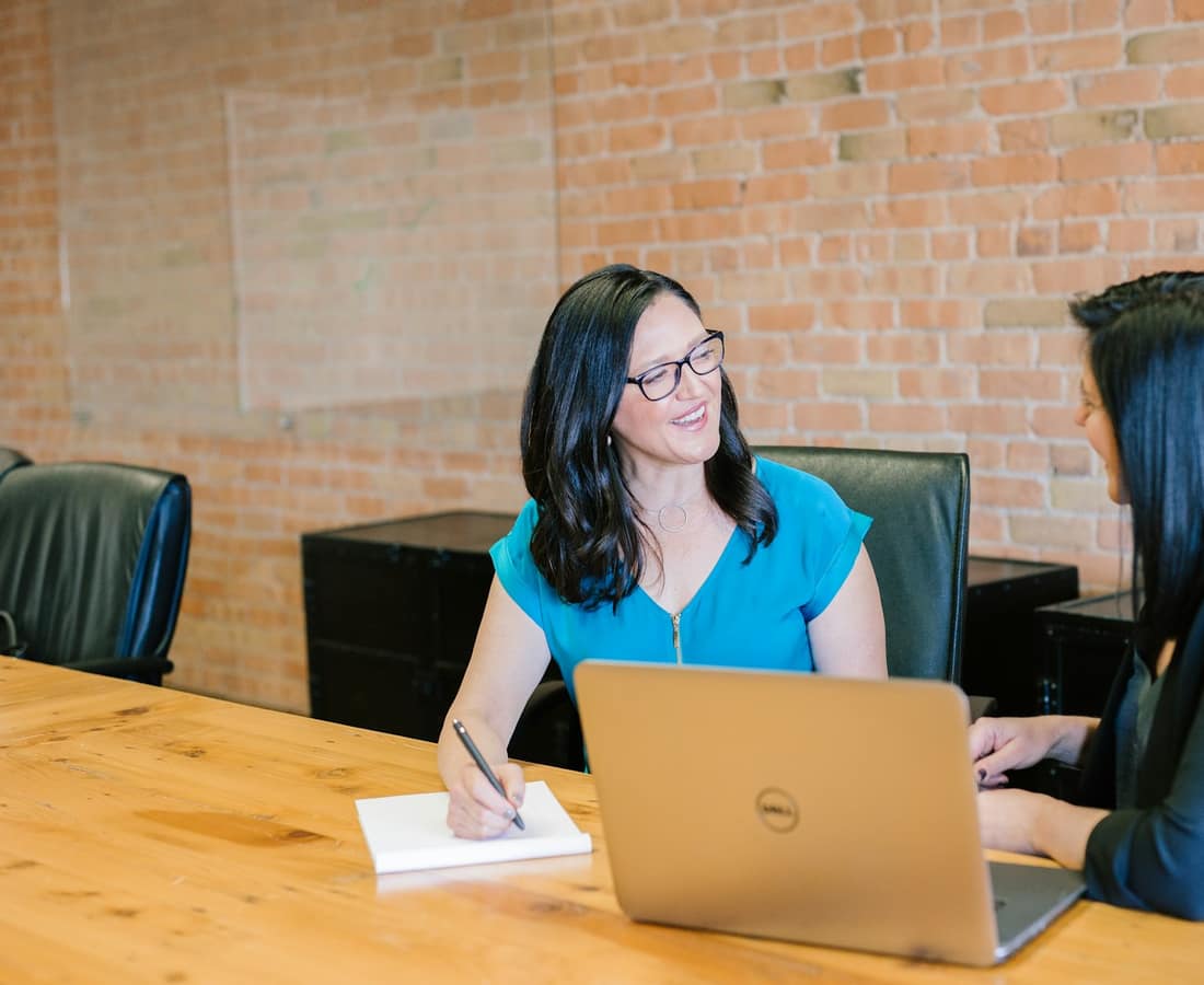 A compliance team in discussion